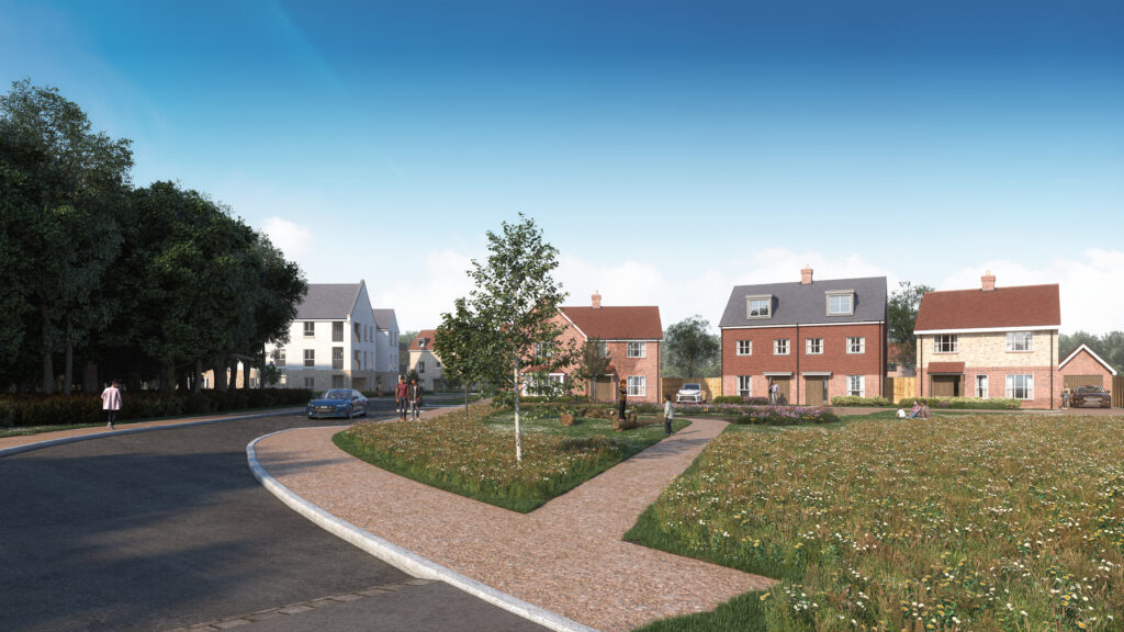 A road and pavement leading to a group of red brick, traditional homes