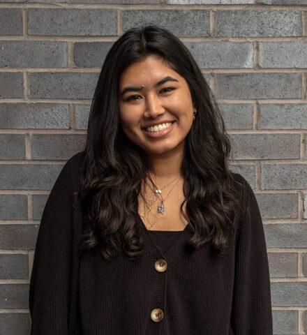 Person smiling at the camera.