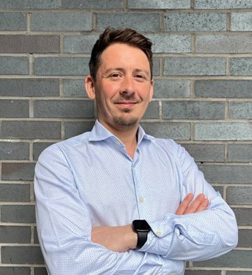 Person smiling at the camera.