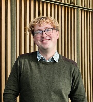Person smiling at the camera.