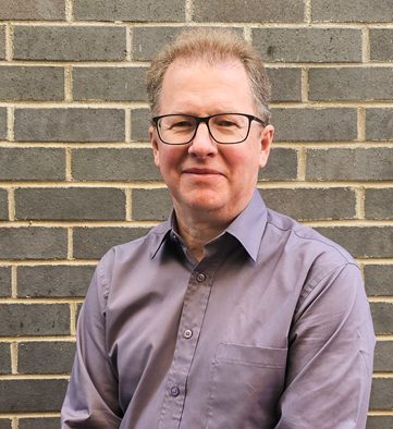 Person smiling at the camera.