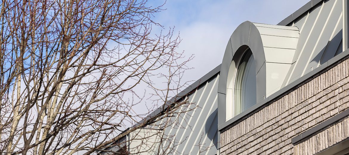 Metal-clad dormer of a Passivhaus residential project in Worthing