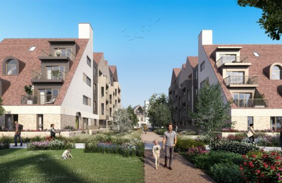 Street scene of residential architectural scheme with green communal spaces.