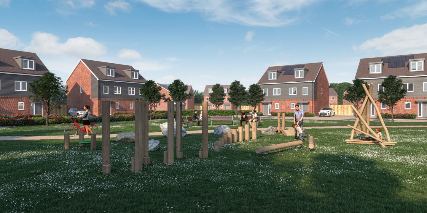 A green playground with children playing, surrounded by houses.