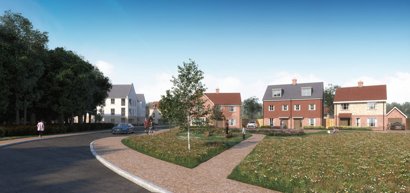 A road and pavement leading to a group of red brick, traditional homes