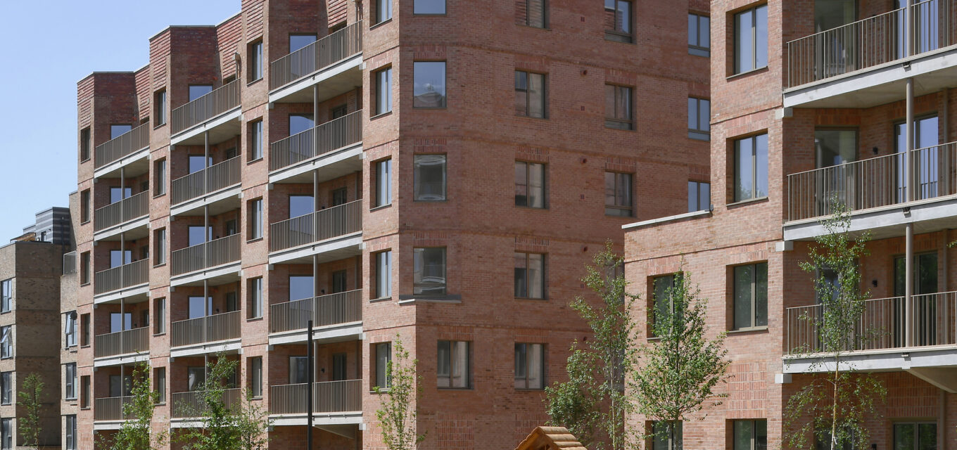 Childrens playground in front of a Passivhaus certified residential social housing in Ealing