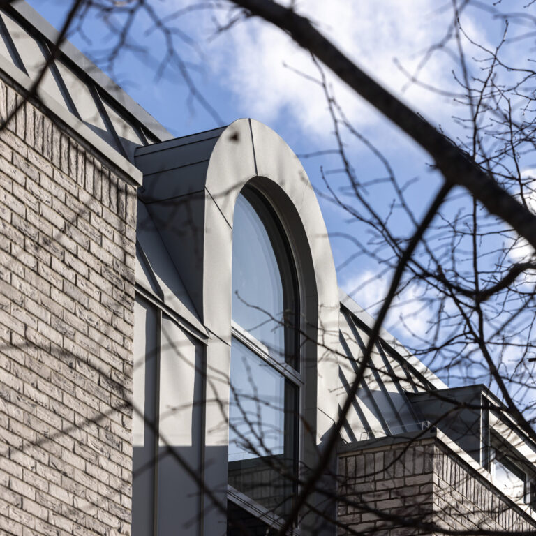 Closeup of windows of a Passivhaus certified emergency housing project in Worthing